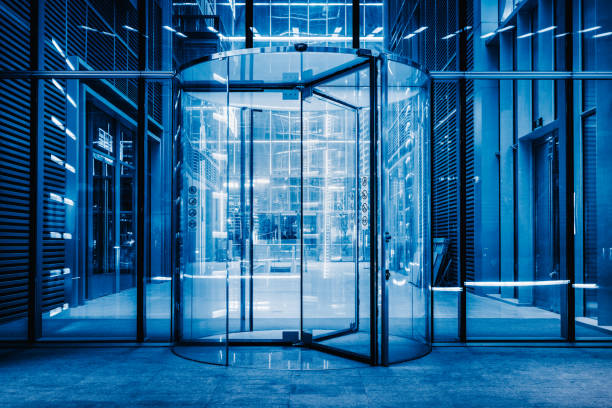 modern entrance with revolving door,blue toned